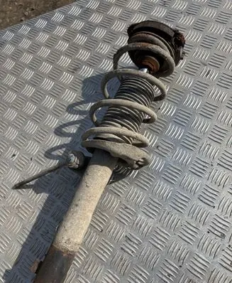 Volkswagen Golf VI Front shock absorber with coil spring 