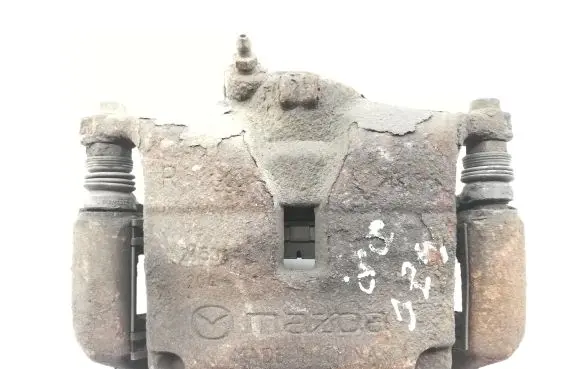 Mazda 3 II Front brake caliper