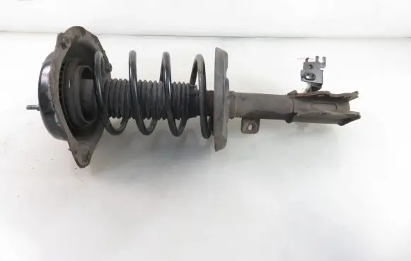 Front shock absorber with coil spring