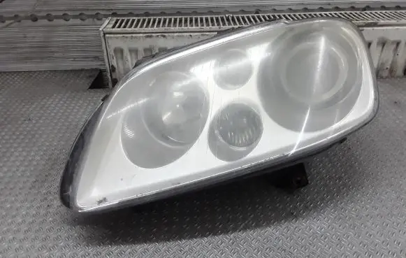 Volkswagen Touran I Headlight/headlamp 1T0941031F