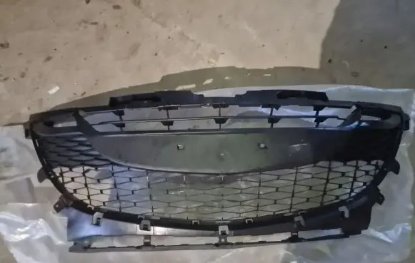 Mazda 3 II Front bumper lower grill BCW8501T1