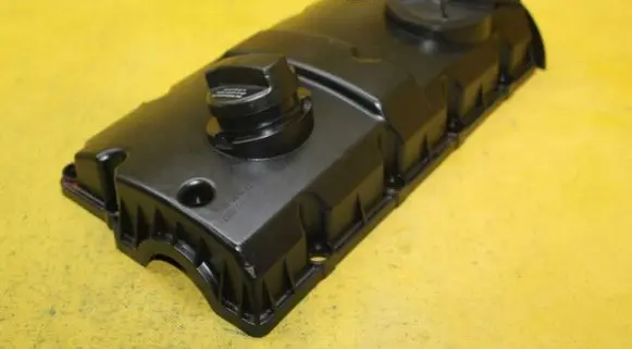 Rocker cam cover