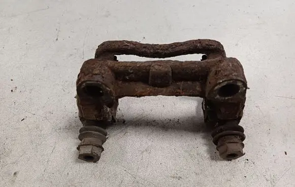 Opel Astra H Brake caliper pad carrier rear 