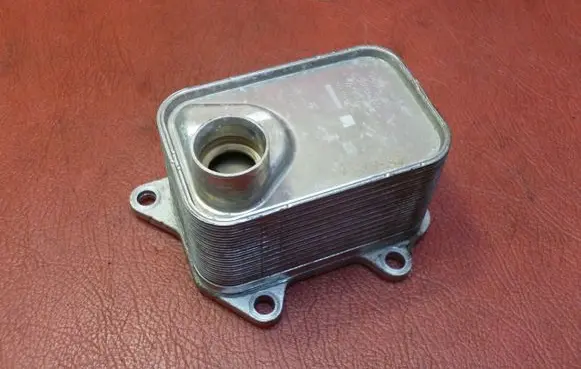 Seat Leon (5F) Oil filter mounting bracket 06L117021C