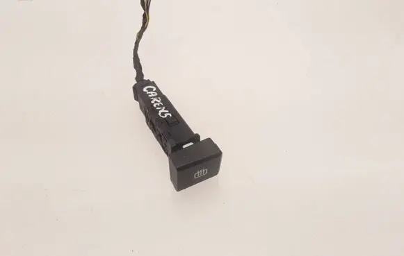 KIA Carens II Windscreen/window heater switch