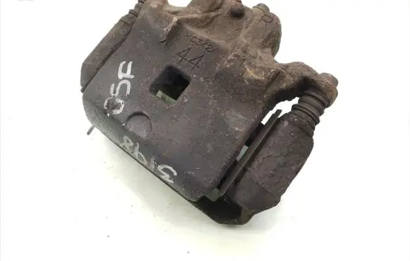 Nissan Juke I F15 Front brake caliper