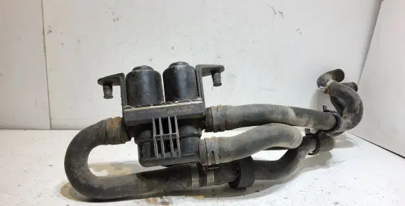Coolant heater control valve