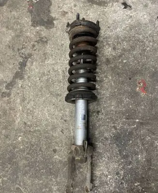 Jeep Grand Cherokee (WK) Front shock absorber with coil spring 32140117