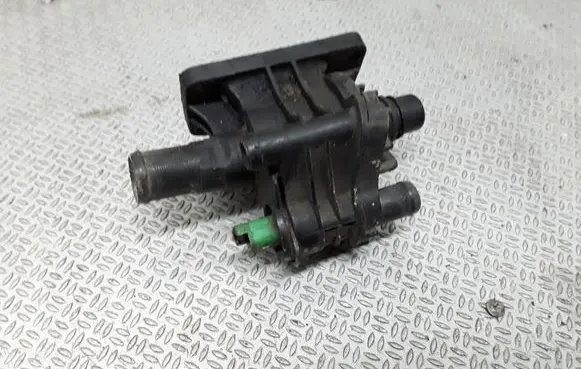 Thermostat/thermostat housing