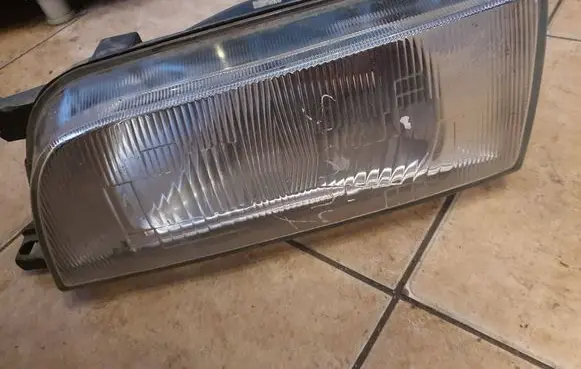 Nissan Sunny Headlight/headlamp 2151140