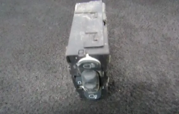 Headlight level height control switch