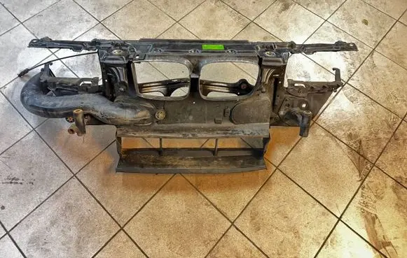 Radiator support slam panel