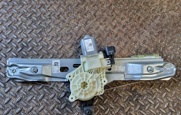 Rear door window regulator with motor