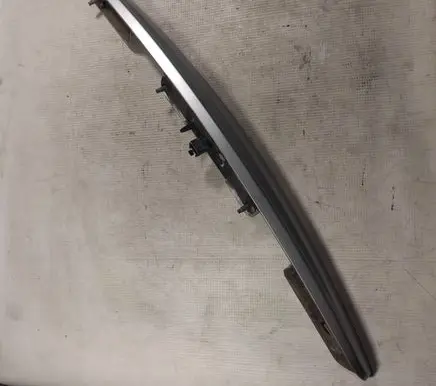 Trunk door license plate light bar