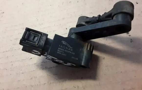 Jaguar XF Headlight level adjustment motor 8W833C279AD