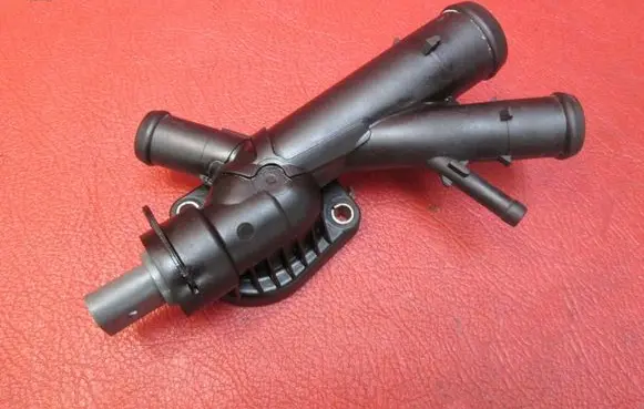 Volkswagen Golf VI Engine coolant pipe/hose 03L121131AA 06A919501A