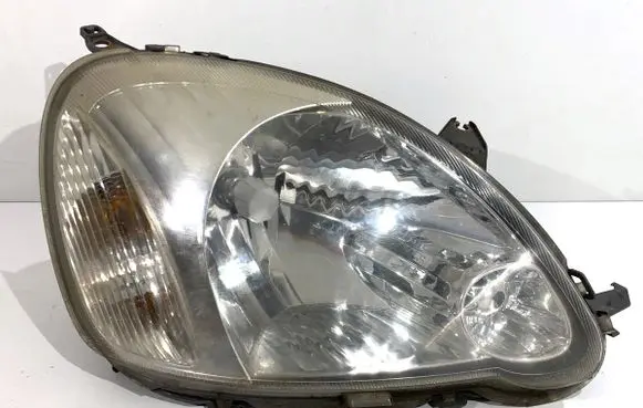 Toyota Yaris Headlight/headlamp 89007613