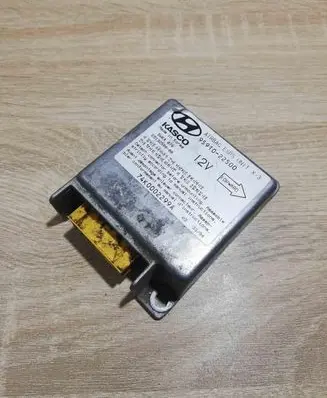Hyundai Coupe Airbag control unit/module 9591022500 74K0002299A