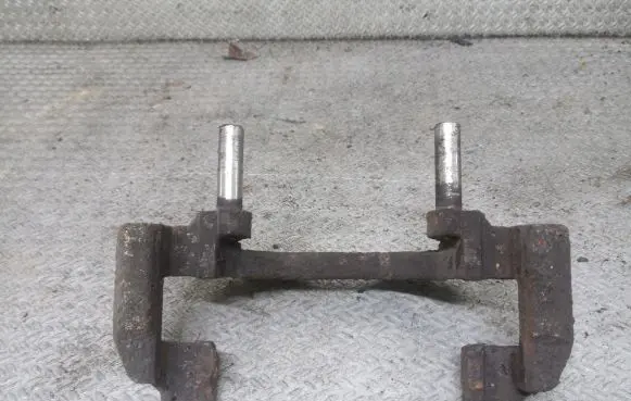 Ford Focus Front Brake Caliper Pad/Carrier 