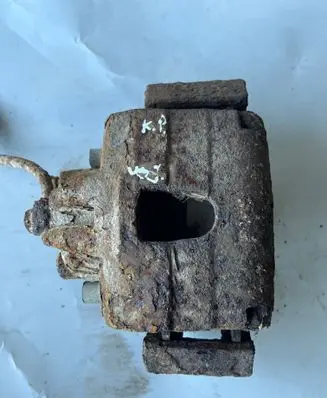 Chrysler Grand Voyager IV Front brake caliper 