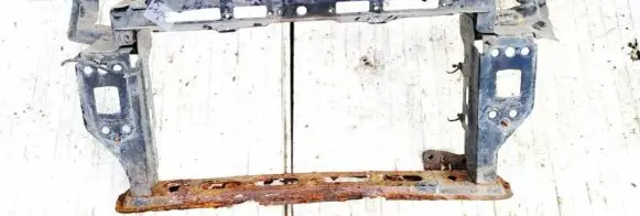 Radiator support slam panel