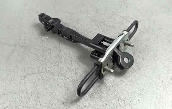 Front door check strap stopper