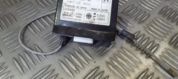 Mazda 323 F Door control unit/module GE4T675D2