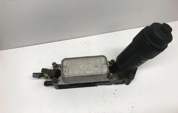 Chrysler 300C Oil filter mounting bracket 05184294AE