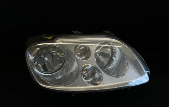 Volkswagen Touran I Headlight/headlamp 1T0941006R