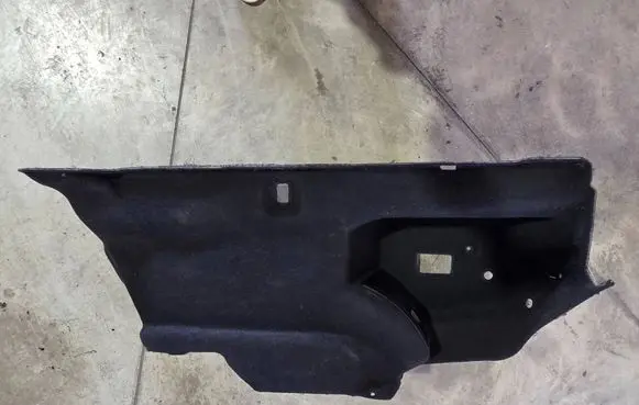 Trunk/boot lower side trim panel