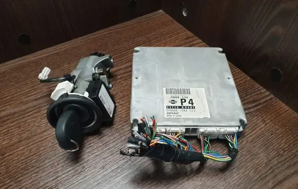 Nissan Primera Engine control unit/module 23710AU601 28590C9965