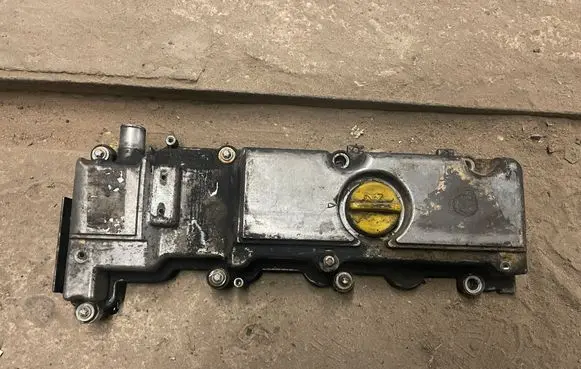 Rocker cam cover