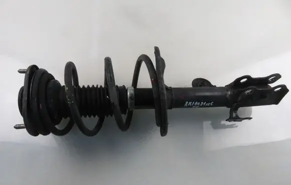 Front shock absorber with coil spring