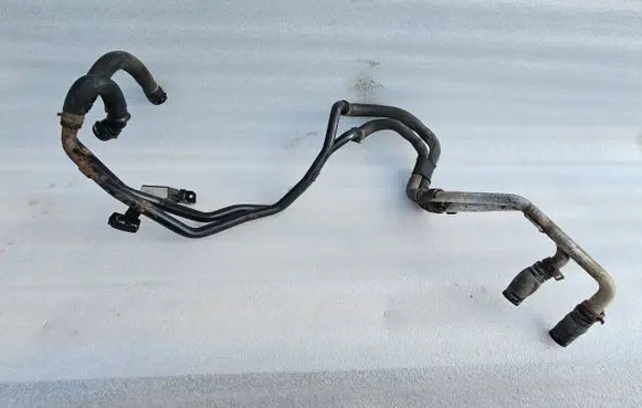 Volkswagen Touareg I Engine coolant pipe/hose 7L6121070AJ