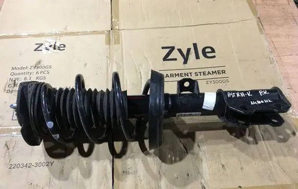 Opel Astra K Front shock absorber with coil spring 39039563