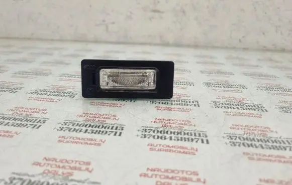 Volkswagen PASSAT B6 Number plate light 8T0943021