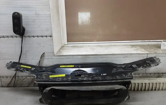 Top upper radiator support slam panel