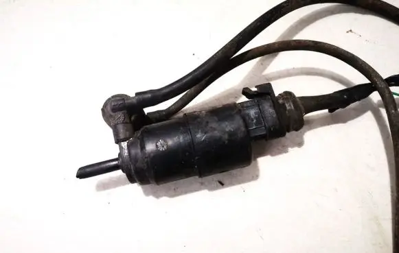 Renault Laguna I Windscreen/windshield washer pump 7700821782