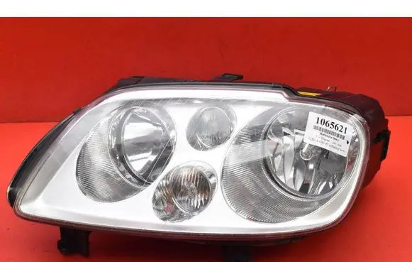 Volkswagen Touran I Headlight/headlamp 1T0941005F