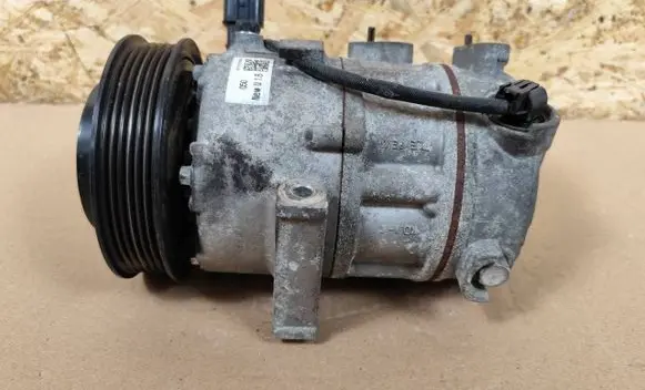 KIA Sportage Air conditioning (A/C) compressor (pump) 97701D7500