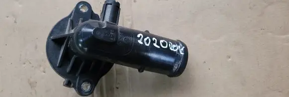Thermostat/thermostat housing