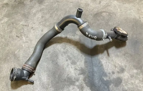 Volkswagen Golf VI Engine coolant pipe/hose 03L121131F