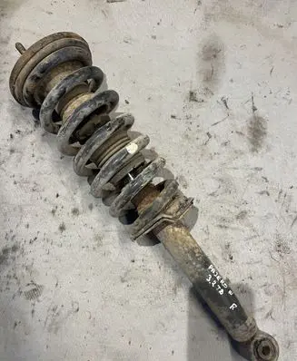 Mitsubishi Pajero Front shock absorber with coil spring