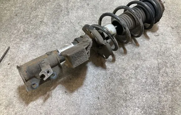 Ford Fiesta Front shock absorber with coil spring E3528206 C1BC18K001BH