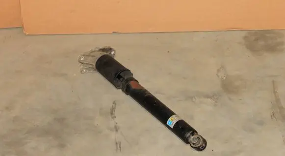 Rear shock absorber/damper