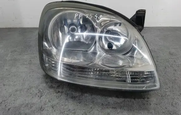 Nissan Almera Tino Headlight/headlamp HELLA