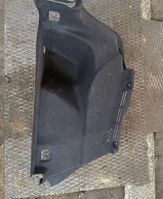 Trunk/boot lower side trim panel