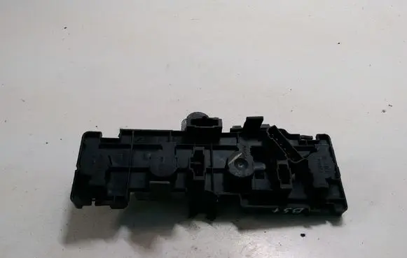 Tail light bulb cover holder