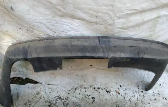 Opel Omega B1 Front bumper lip pilkas
