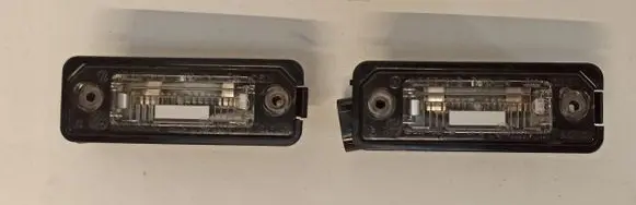 Volkswagen Eos Number plate light 1J6943021B